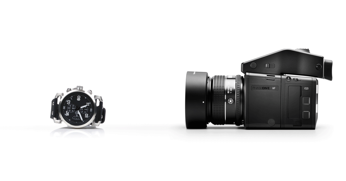 360 spin of men's watch next to camera