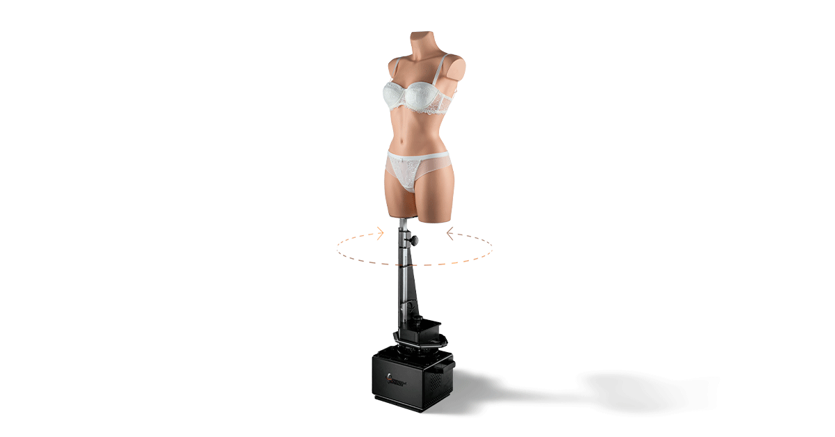 Female mannequin on 360-degree rotating device.