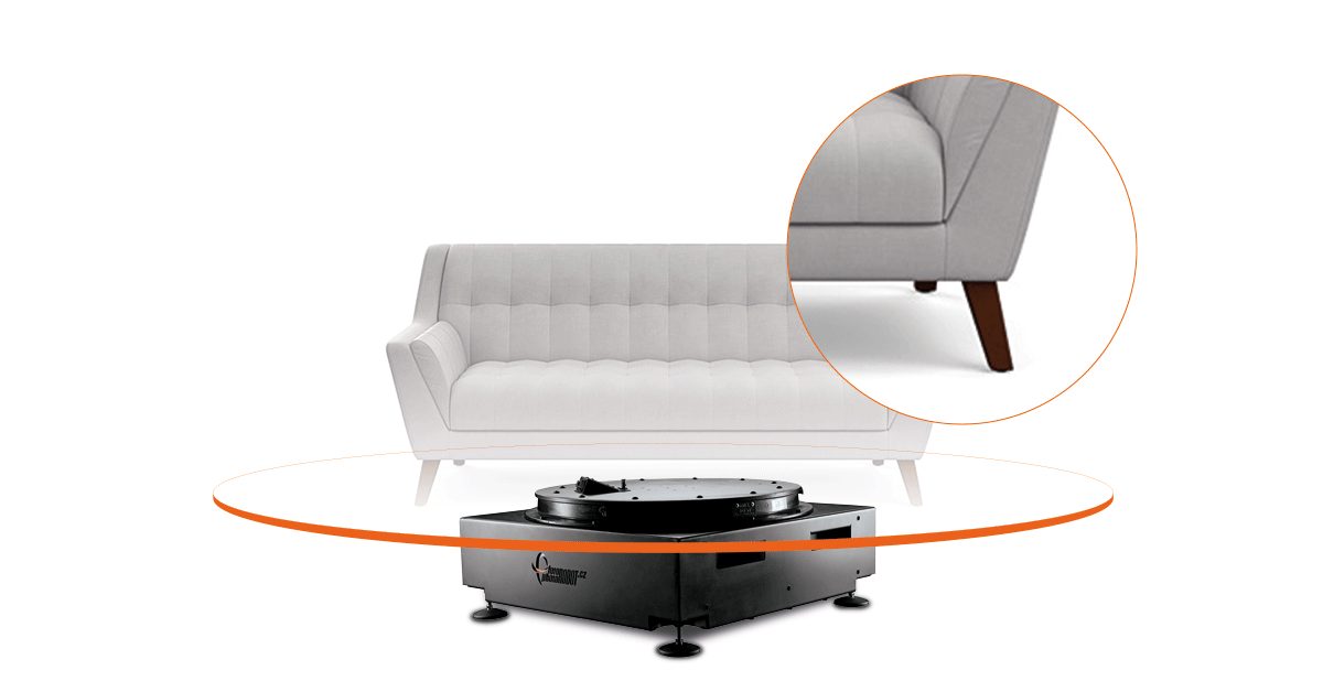 Photography turntable holding sofa with zoom into details.