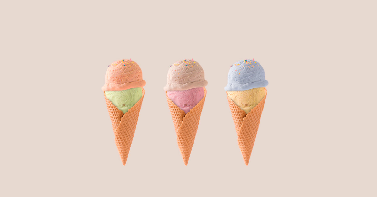Different color 3D ice-cream cones beside each other.