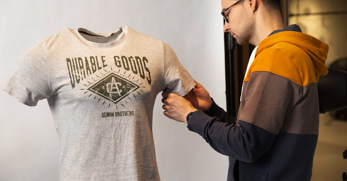 Straighten out the fabric on the mannequin to best fit its shape and to appear as if an invisible model is wearing the item.