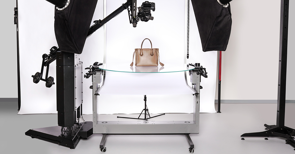 Workstation with turntable, handbag, camera and lights.