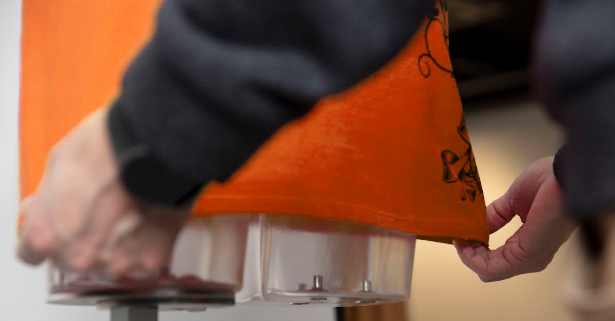 Close-up of styling hem of dress.