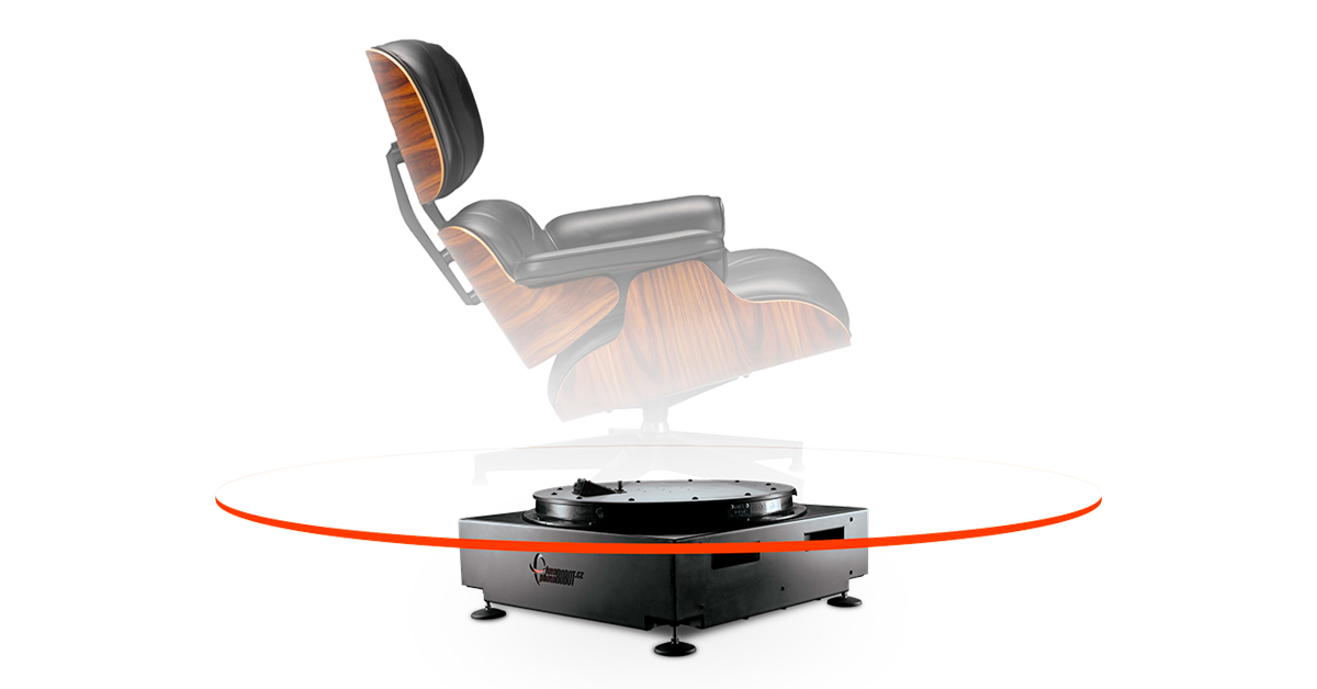 Image of armchair on rotating platform.