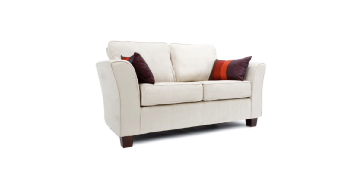 Photo of light-colored sofa with pillows.