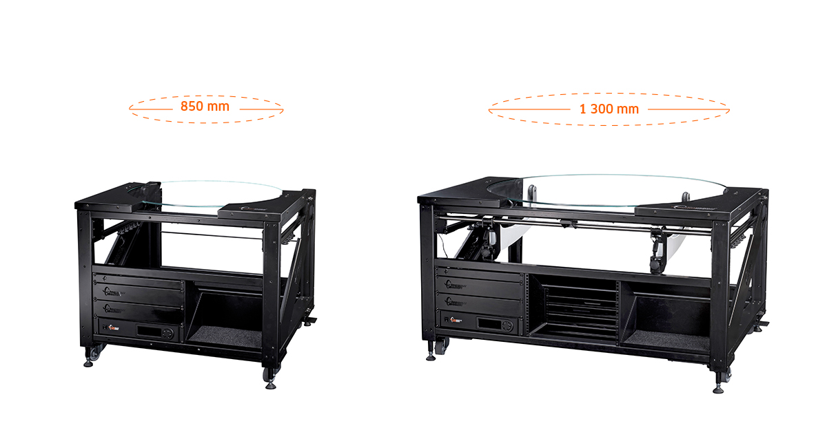 Two different size motorized, rotary photography turntables.