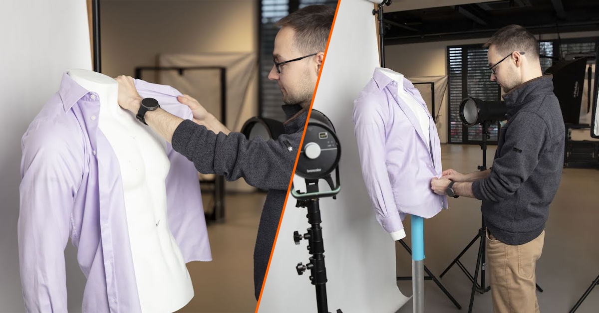 Photographer putting sleeves on mannequin and doing buttons.