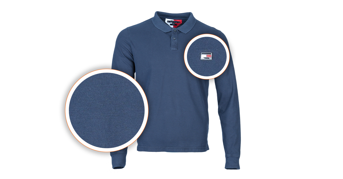 Photo of shirt with detailed zooms of logo and material.