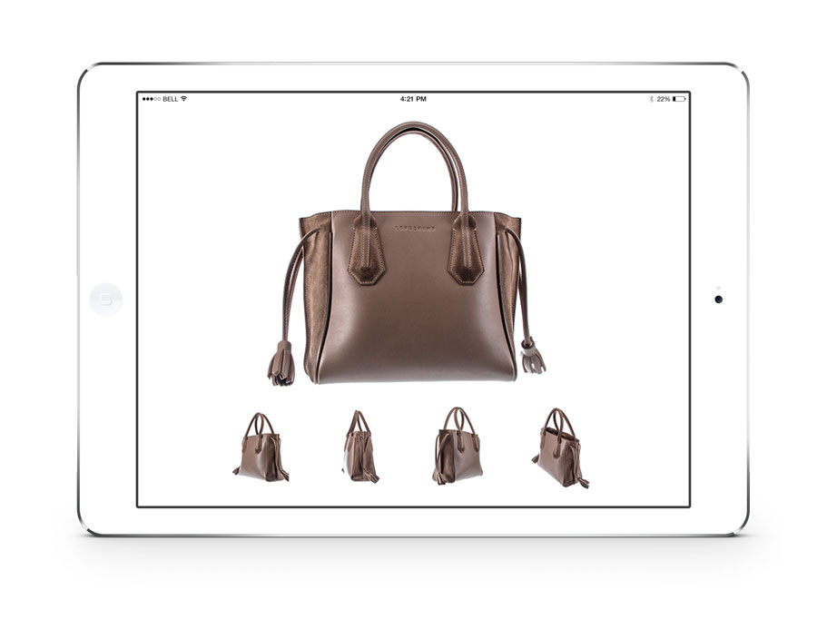 Handbag product photos displayed on tablet screen.