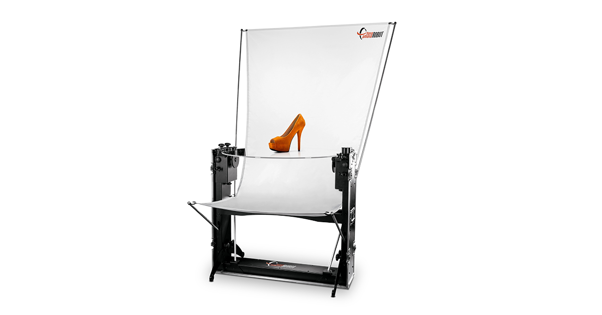 Orange high-heel shoe on workstation turntable