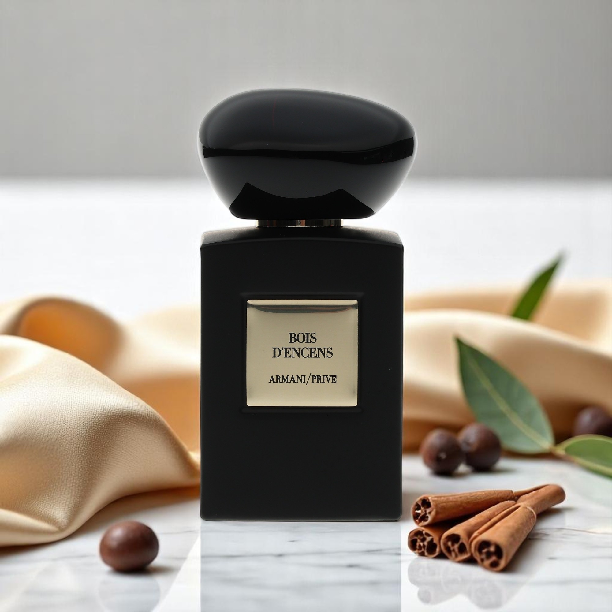 Bois D’Encens by Armani/Prive appears with fragrance ingredients in the background and foreground.