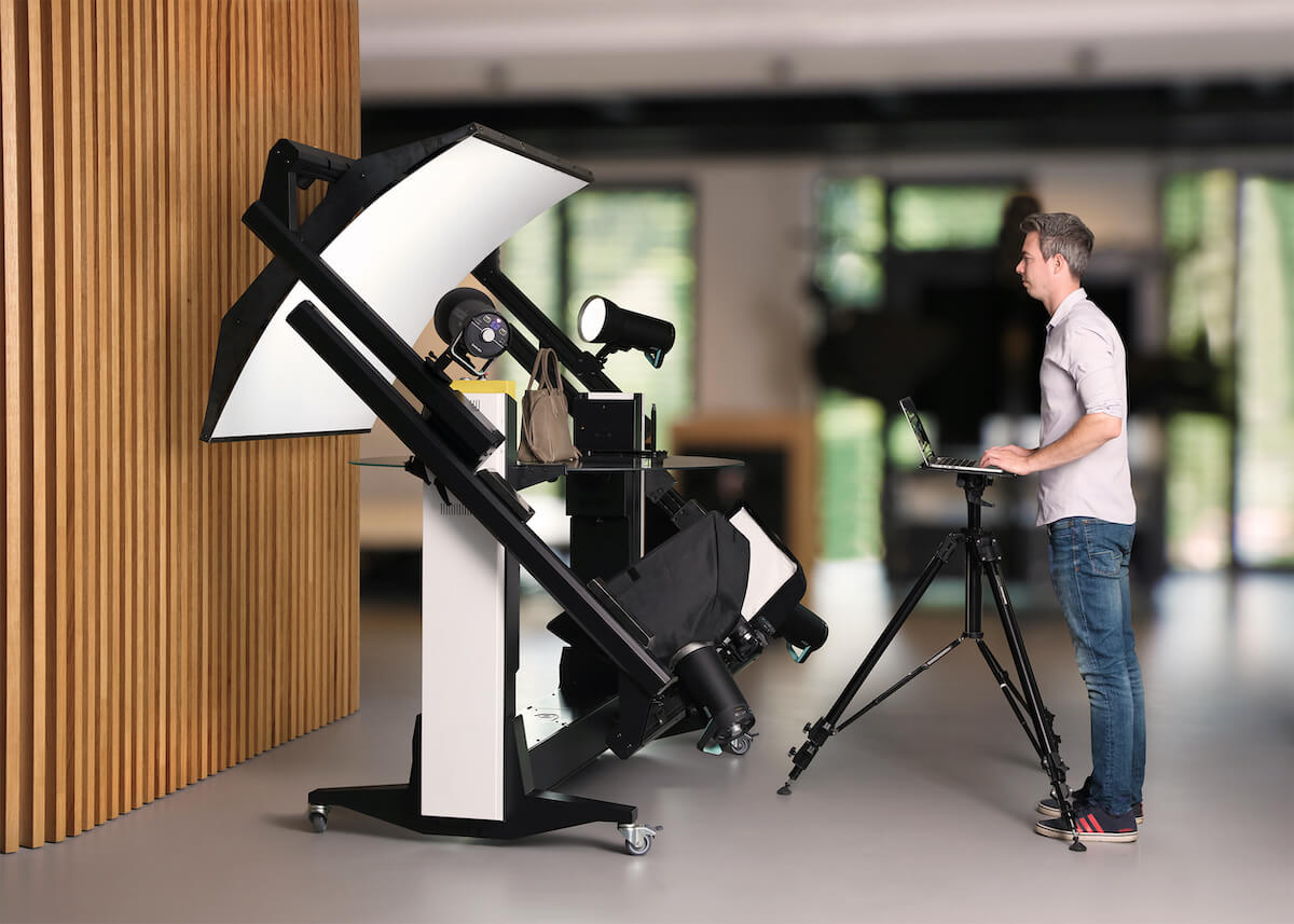 Studio photographer uses the Frame turntable to capture product.